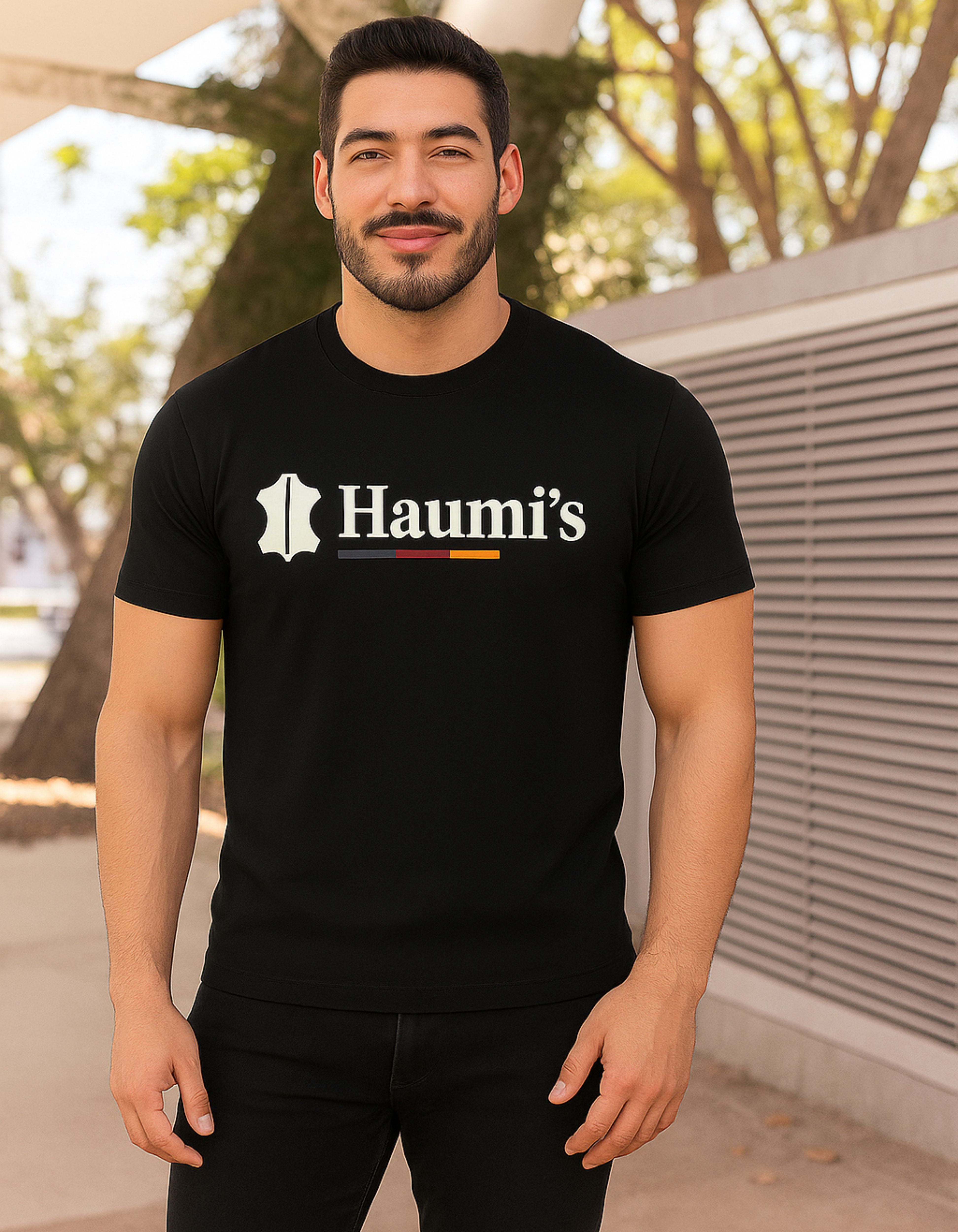 Black T-Shirt with 'Haumi’s' Brand featuring logo on the front, designed by My Store for everyday motivation.